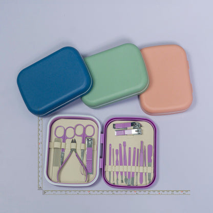 Manicure set with tools in an open case, surrounded by closed cases on a light purple background.